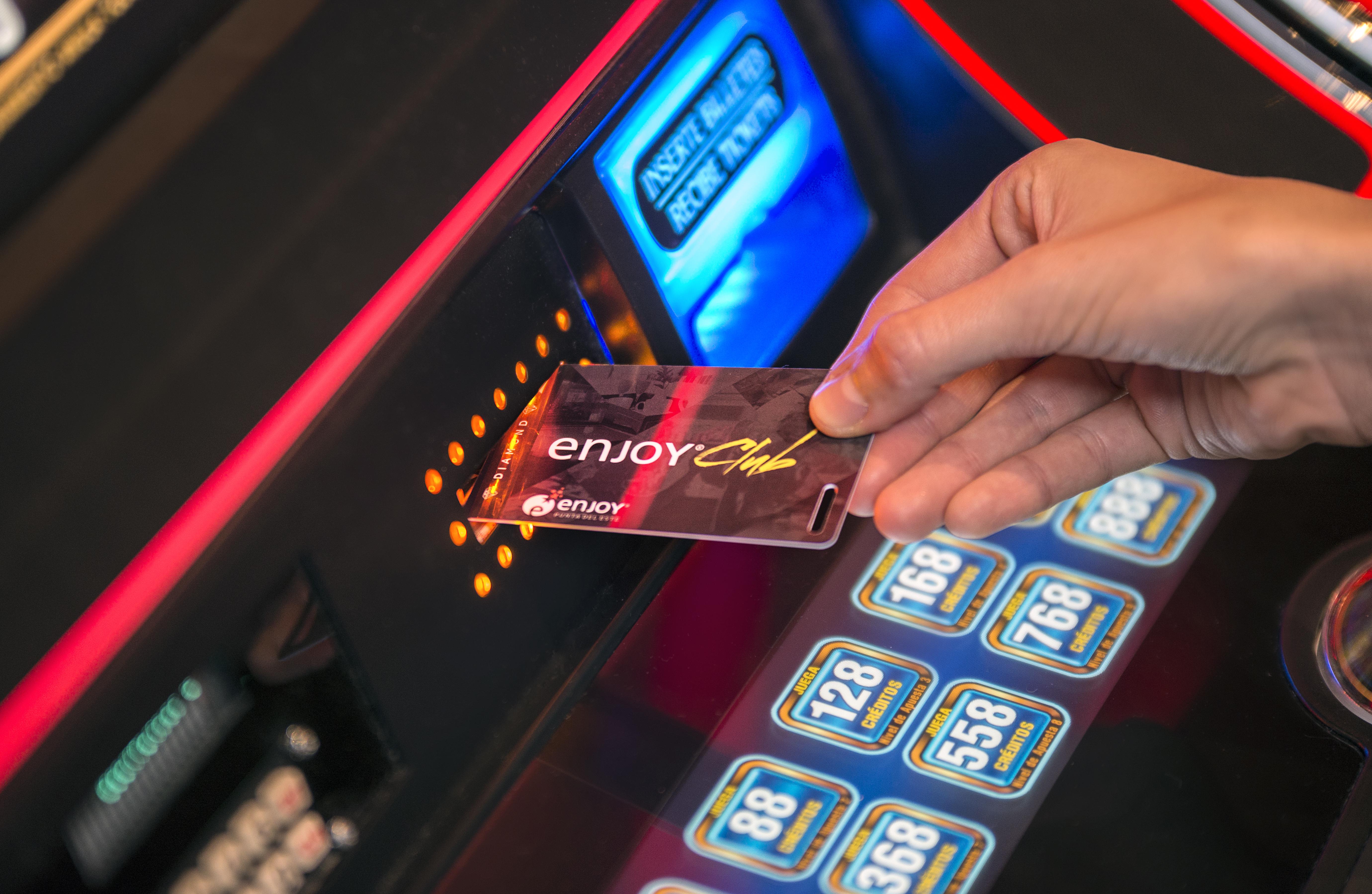 Enjoy Punta Del Este Kültér fotó A card being inserted into a slot machine